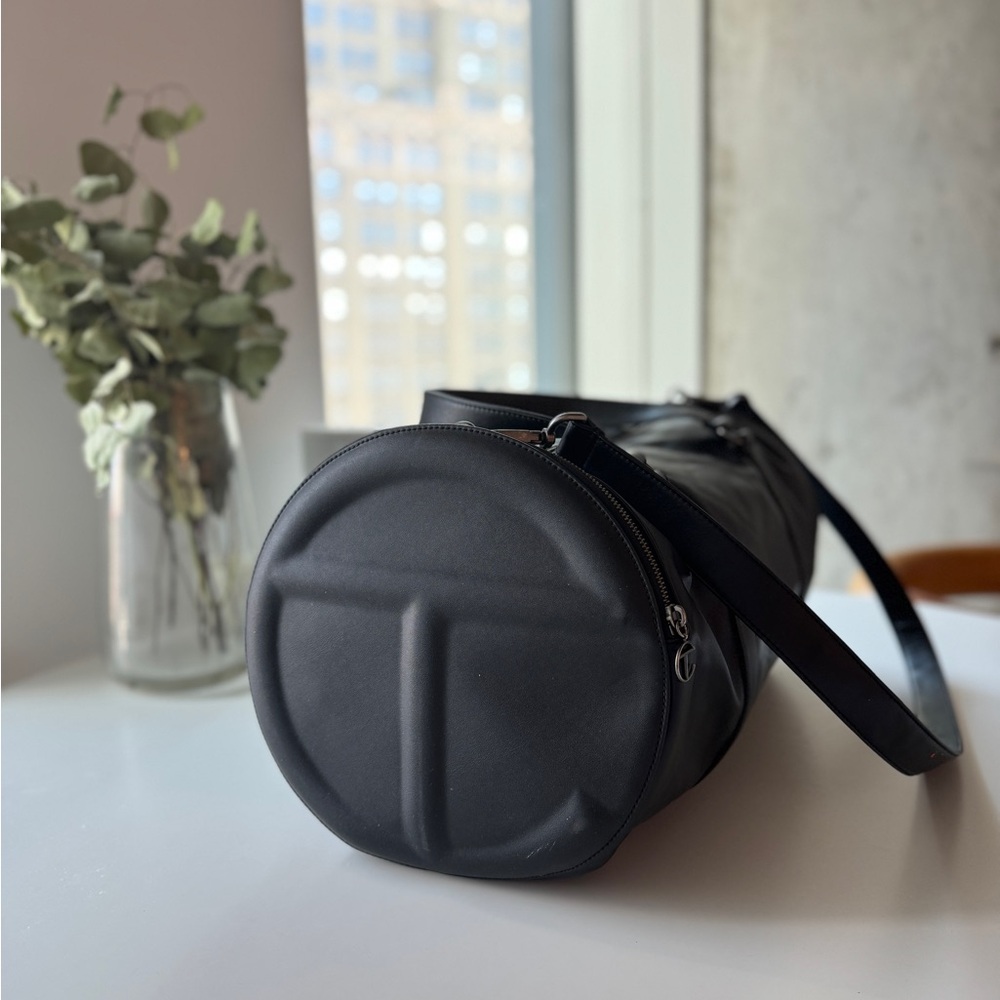 Classic Telfar black duffle bag.